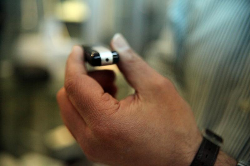 A cellphone with a hidden camera on the top.